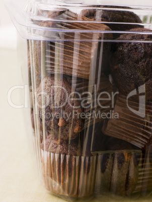 Double Chocolate Chip Muffins In A Plastic Box