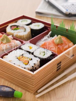 Sushi And Sashimi In A Take Away Bento Box