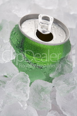 Green Can Of Fizzy Soft Drink Set In Ice With The Ring Pulled