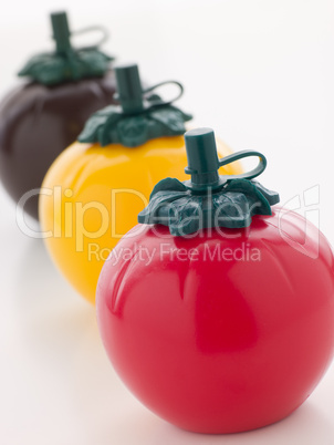 Three Tomato Shaped Sauce Bottles
