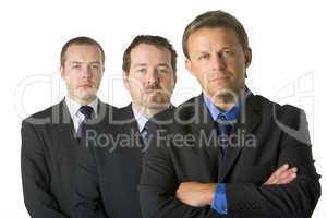 Group Of Businessmen Looking Stern