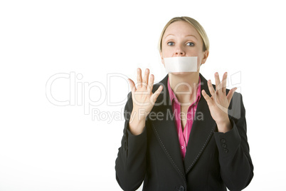 Businesswoman With Her Mouth Taped Shut