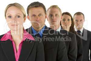 Group Of Business People In A Line Looking Serious