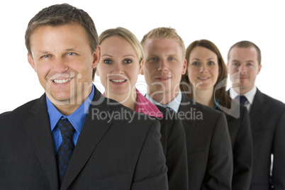 Group Of Business People In A Line Smiling