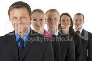 Group Of Business People In A Line Smiling