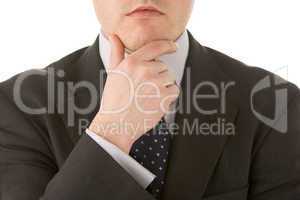 Businessman Holding His Hand Up To His Chin