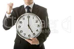 Businessman Holding Clock