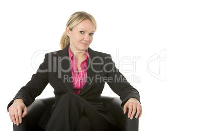 Businesswoman Sitting In Leather Chair