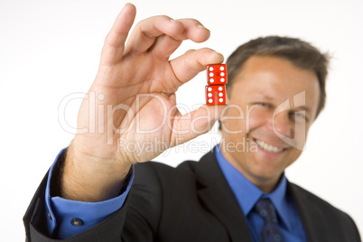 Businessman Holding Two Red Dice