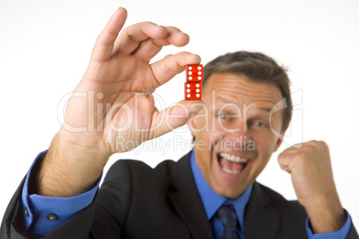 Businessman Holding Two Red Dice