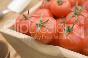 Red Tomatoes In A Wooden Trug