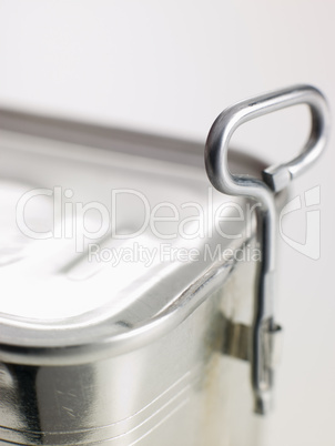 Close Up Of Opener On Tin Can