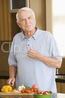 Man Cutting Up Vegetables