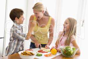 Mother And Children Prepare A meal,mealtime Together