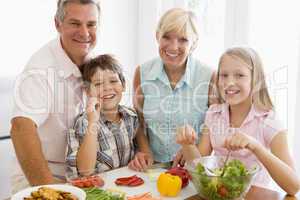 Grandparents And Grandchildren Prepare A meal,mealtime Together