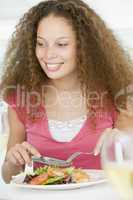 Woman Eating meal,mealtime With A Glass Of Wine