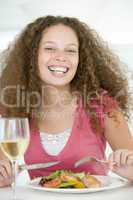 Woman Eating meal,mealtime With A Glass Of Wine