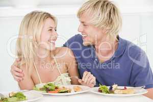 Young Couple Enjoying meal,mealtime Together