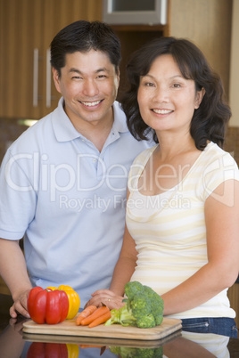 Husband And Wife Preparing meal,mealtime Together