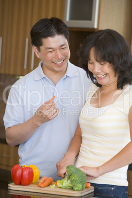 Husband And Wife Preparing meal,mealtime Together