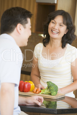 Husband And Wife Preparing meal,mealtime Together