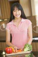 Woman Chopping Vegetables