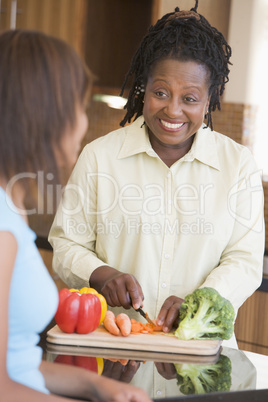 Couple With Daughter Preparing meal,mealtime