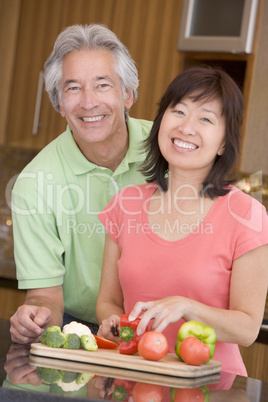 Husband And Wife Preparing meal,mealtime Together