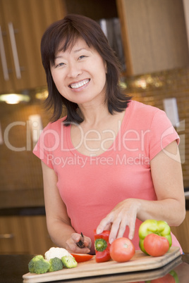 Woman Chopping Vegetables