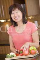 Woman Chopping Vegetables