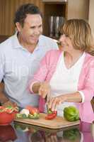 Husband And Wife Preparing meal,mealtime Together