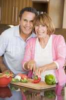 Husband And Wife Preparing meal,mealtime Together