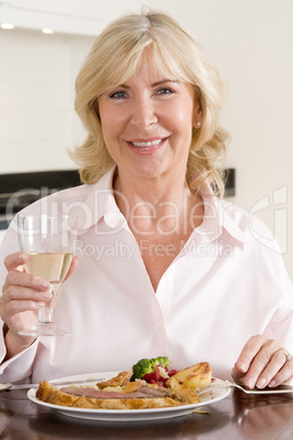 Women Enjoying meal,mealtime With A Glass Of Wine