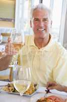 Man Enjoying meal,mealtime With A Glass Of Wine