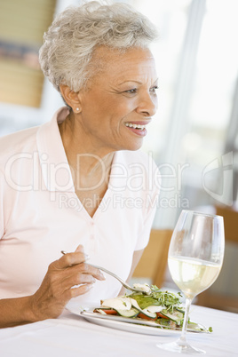 Woman Enjoying meal,mealtime With A Glass Of Wine