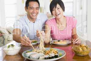 Young Couple Enjoying Chinese Food