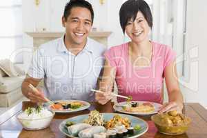 Young Couple Enjoying Chinese Food