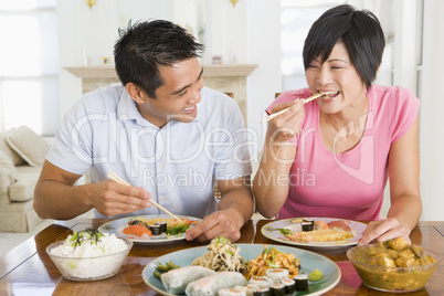 Young Couple Enjoying Chinese Food