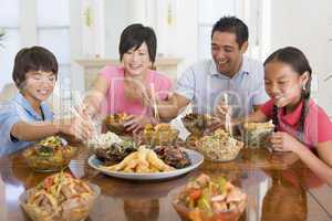 Family Enjoying meal,mealtime Together