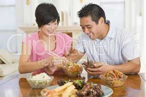 Young Couple Enjoying Chinese Food