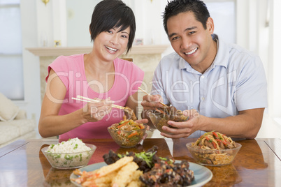 Young Couple Enjoying Chinese Food