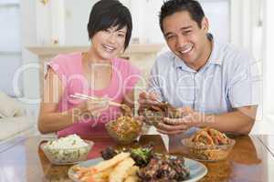 Young Couple Enjoying Chinese Food