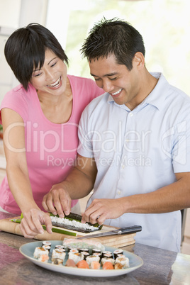 Couple Preparing Sushi Together