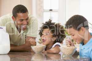 Children Eating Breakfast With Dad