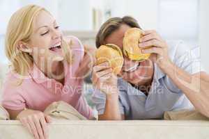 Couple Enjoying Burgers Together