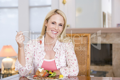 Woman Enjoying Healthy meal,mealtime