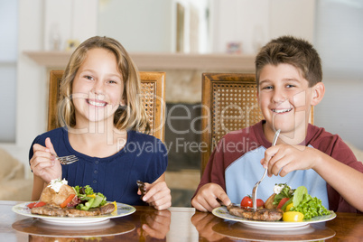 Brother And Sister Eating meal, mealtime Together