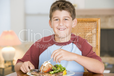 Young Boy Eating meal,mealtime