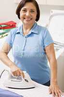 Woman Ironing Shirt