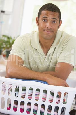 Man Leaning On Laundry